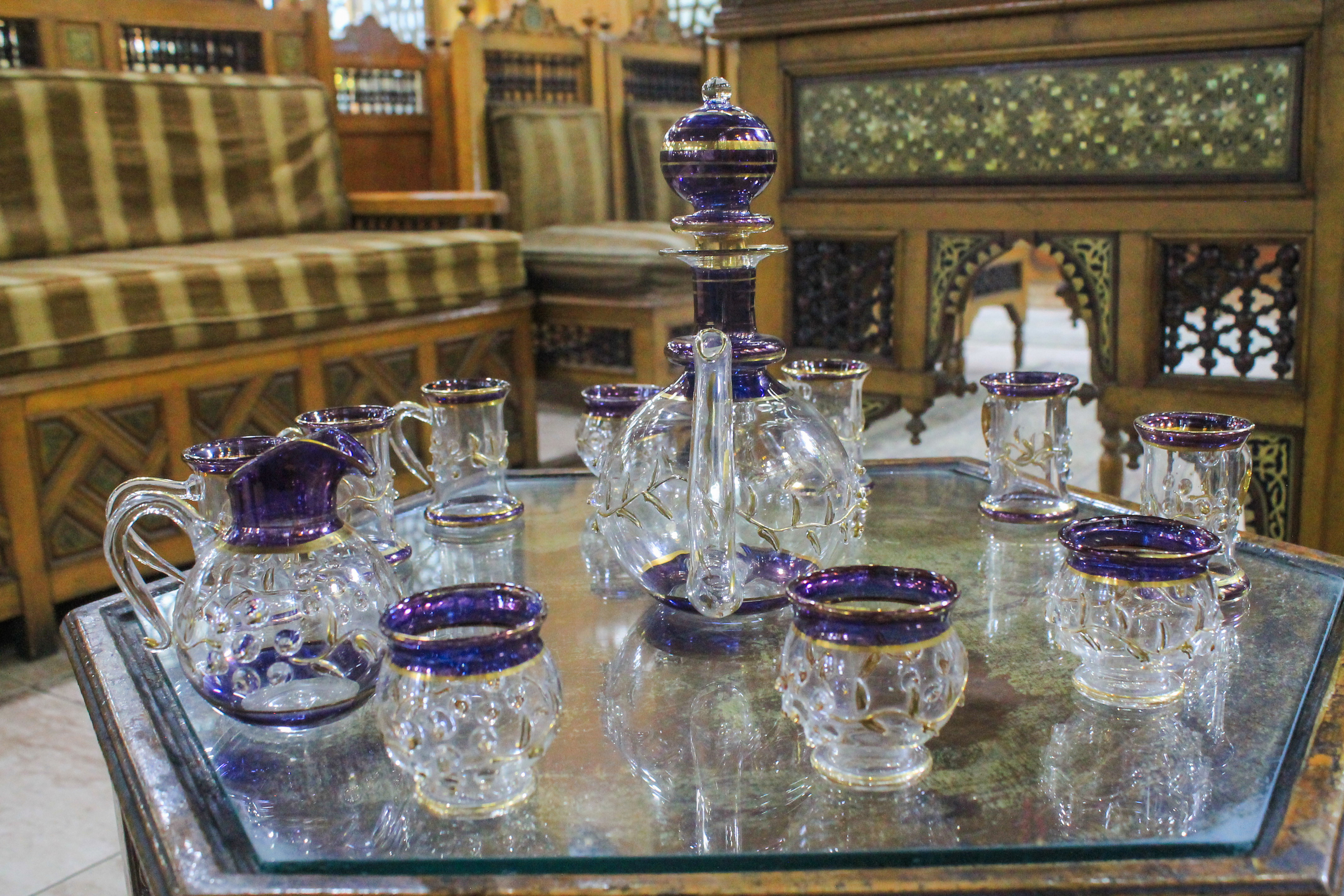 Our signature blue-rimmed glass tea set, used to serve traditional hibiscus tea to every guest since 1990.