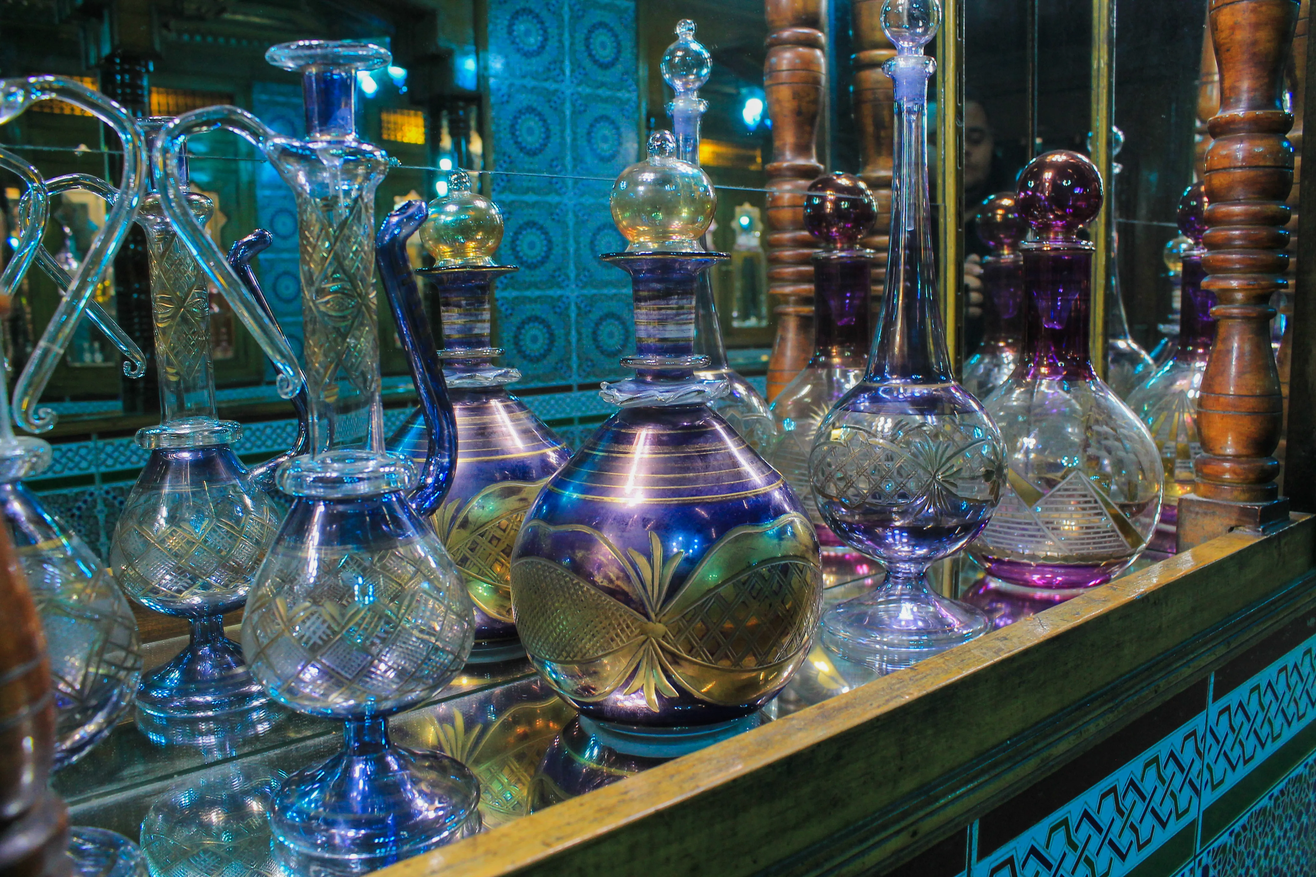 Vibrant cobalt blue and violet artisanal bottles, reflecting the colorful heritage of Egyptian craftsmanship.